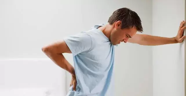 Pain in the lumbosacral region in men is a symptom of chronic prostatitis